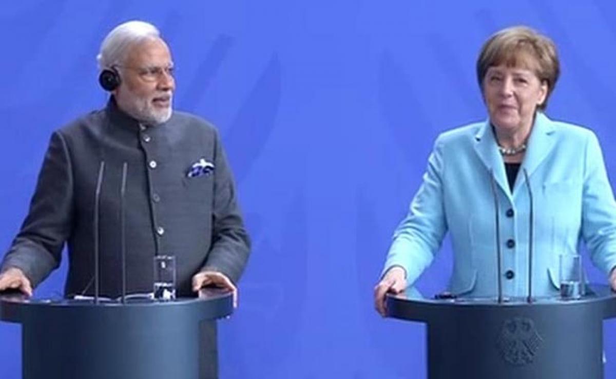 Narendra Modi-Angela Merkel in dialogue mode